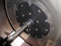 Close up of the flange that attaches the roaster to the shaft