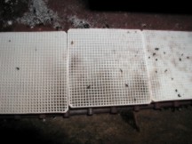 Perforated ceramic heat shield tiles